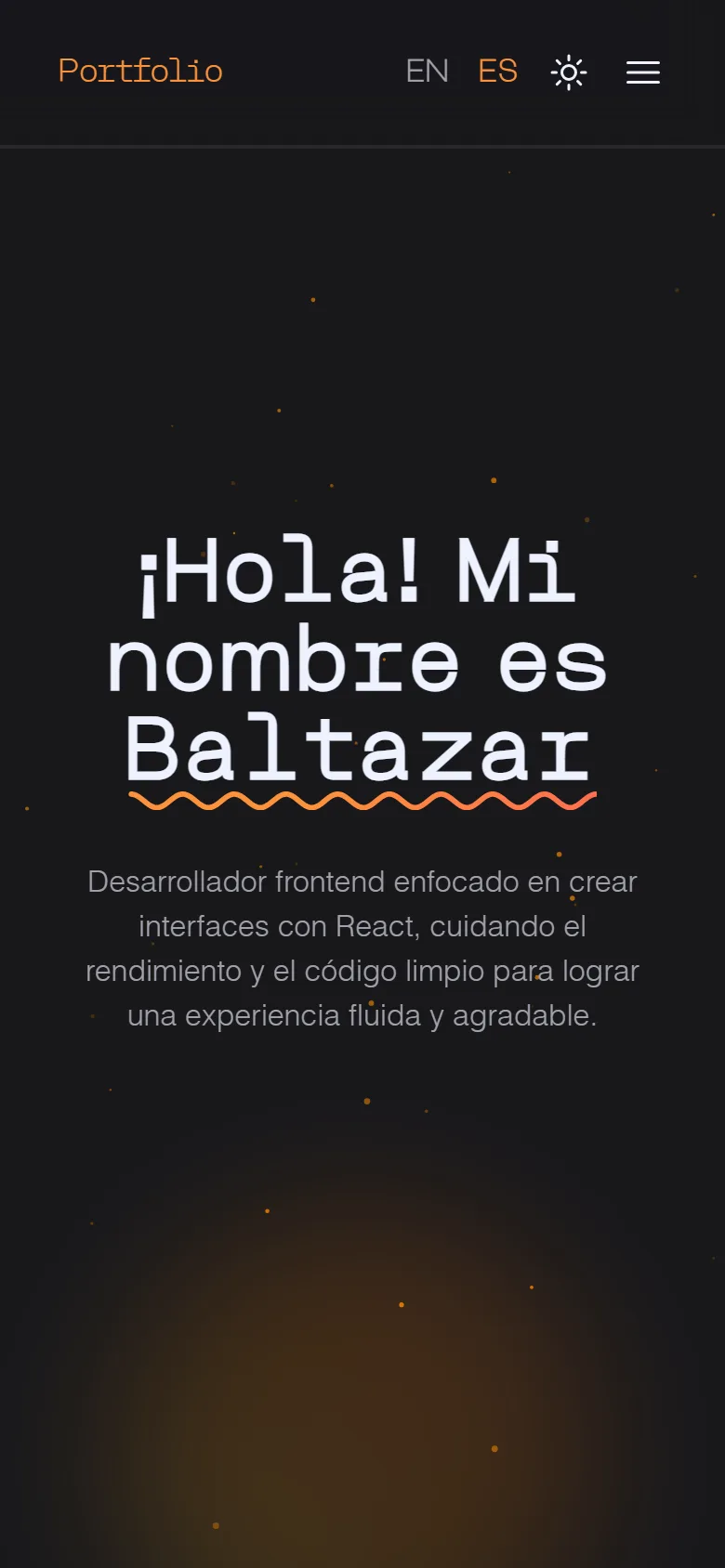 The home page in Spanish on mobile, with the language switcher beside the theme toggle.